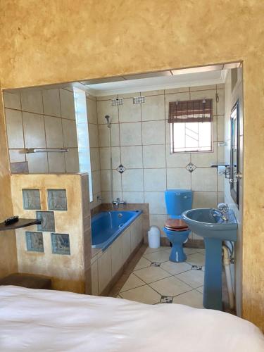 Phòng tắm tại The Orange room