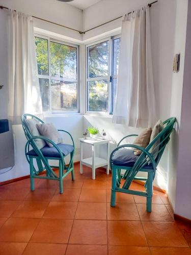 Ruang duduk di Serendipia Chalets de Montaña