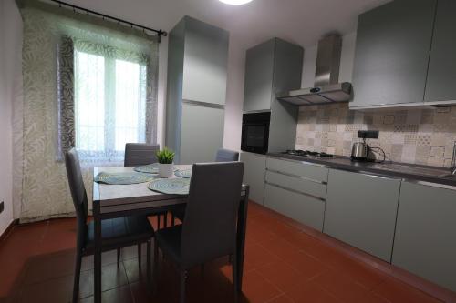 Kuchyň nebo kuchyňský kout v ubytování Il Quadrifoglio B&B