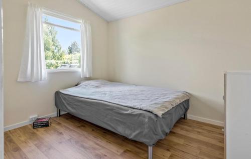 Ένα ή περισσότερα κρεβάτια σε δωμάτιο στο 2 Bedroom Nice Home In Ølsted