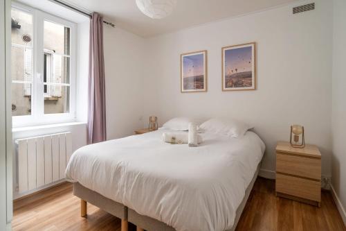 Katil atau katil-katil dalam bilik di Appartement Tempio - Welkeys
