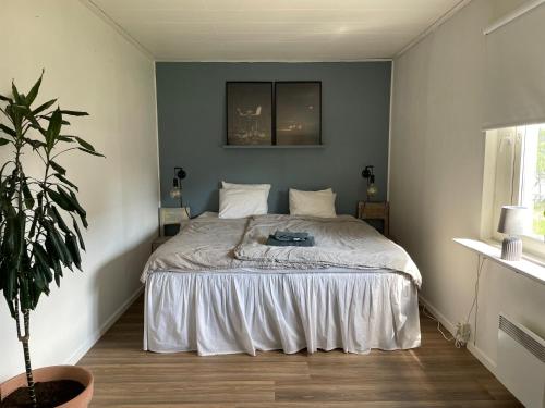 a bedroom with a large bed in a room at Familjevänligt hus i Kiruna in Kiruna