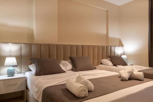 Postel nebo postele na pokoji v ubytování Altobelo Hotel