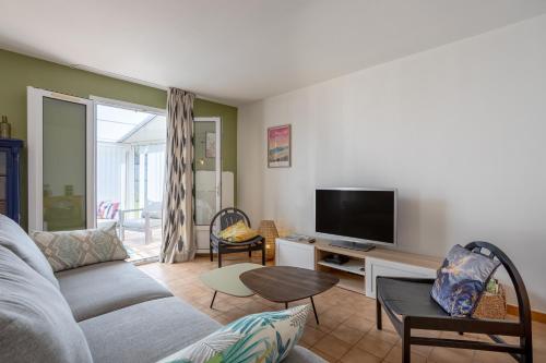 TV o dispositivi per l'intrattenimento presso Maison Avec Jardin 400m Du Centre