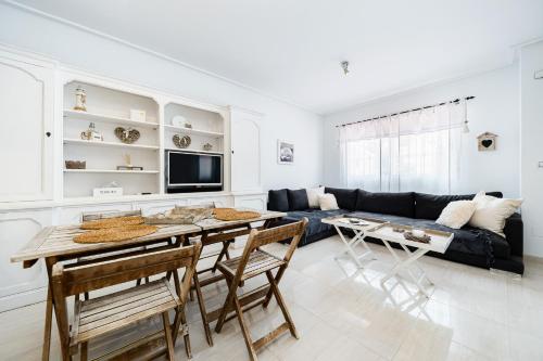 TV a/nebo společenská místnost v ubytování Bungalow La Zenia cerca de la playa