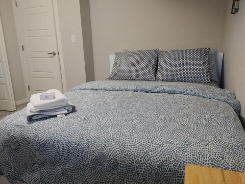 Postel nebo postele na pokoji v ubytování Genesis Townhouse