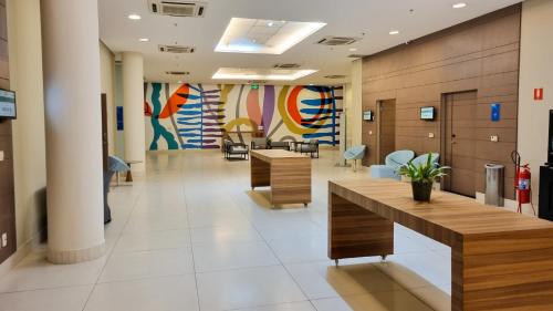a lobby of a hospital with a waiting room at Novotel Rio de Janeiro Parque Olimpico in Rio de Janeiro
