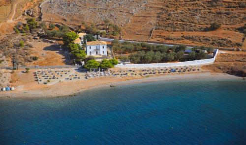 an aerial view of a beach with a building at Hydra Erato in Hydra