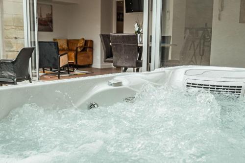 Appartement jacuzzi et terrasse