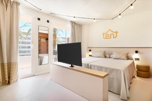 Postel nebo postele na pokoji v ubytování tent Calvia Beach