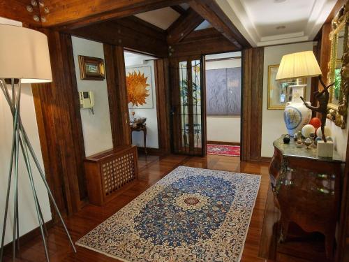 a living room with a rug on the floor at B&B Villa Sbaraglia in Alatri