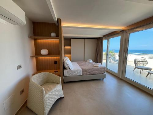 Postel nebo postele na pokoji v ubytování Hotel Orchidea