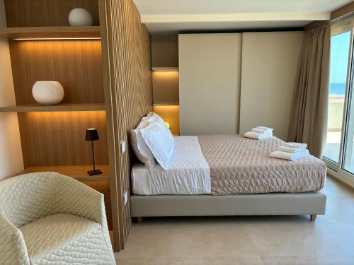 Postel nebo postele na pokoji v ubytování Hotel Orchidea