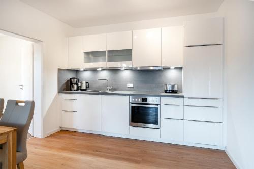 Kuchyň nebo kuchyňský kout v ubytování Apartment am Deich 01