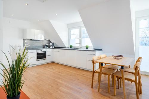Kuchyň nebo kuchyňský kout v ubytování Apartment am Deich 04