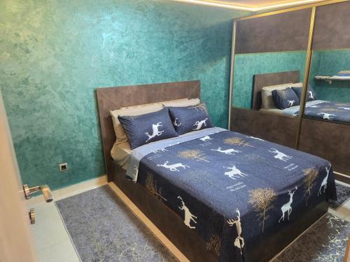 Postel nebo postele na pokoji v ubytování Agréable maisonnette au centre de Rabat