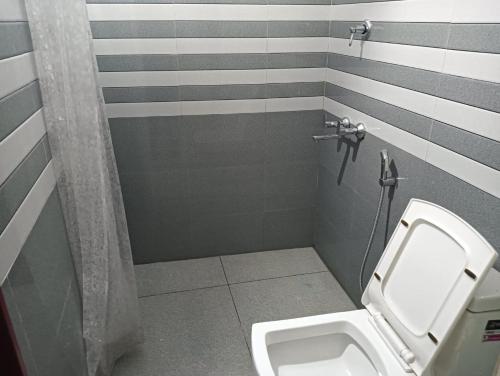 Koupelna v ubytování KRK ROOMS Kottarakara