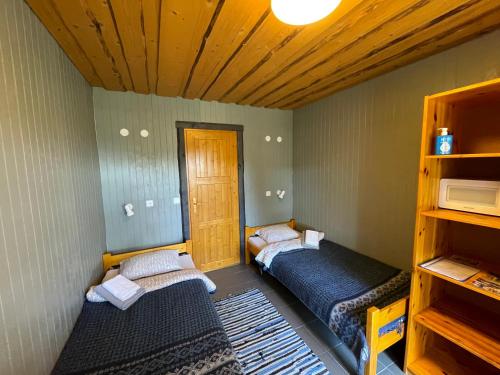 Postel nebo postele na pokoji v ubytování Hostel Kalameeste Maja