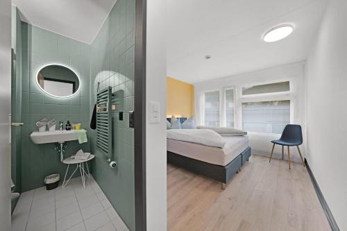 Postel nebo postele na pokoji v ubytování B&B Bellagio Davos