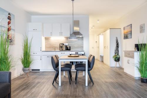 Kuchyň nebo kuchyňský kout v ubytování Meerblickvilla Großenbrode Wohnung 21