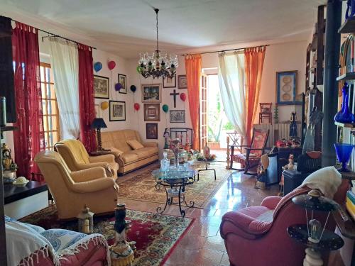 Posezení v ubytování Alchimia tra suoni e colori