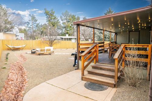 a wooden pavilion with a table and a hammock at Stunning Javelina Hideaway with Hot Tub and King Bed in Sedona