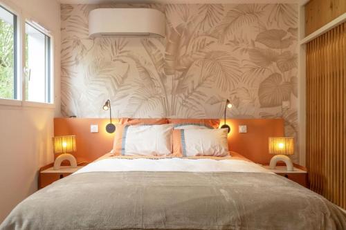 a bedroom with a large bed with a wall at Superbe maison sur pilotis in Savy-Berlette