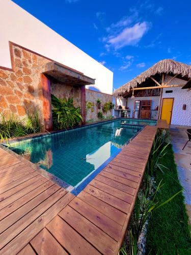 Kolam renang di atau dekat dengan Flats Elementus Preá