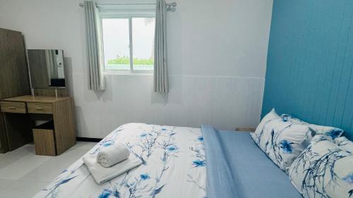 Ein Bett oder Betten in einem Zimmer der Unterkunft Wave Crest Retreat