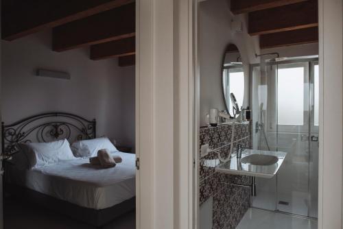 Postel nebo postele na pokoji v ubytování Villa delle Querce Resort