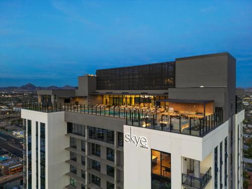 a building with the sz agency on top of it at Global Luxury Suites at Downtown Phoenix in Phoenix