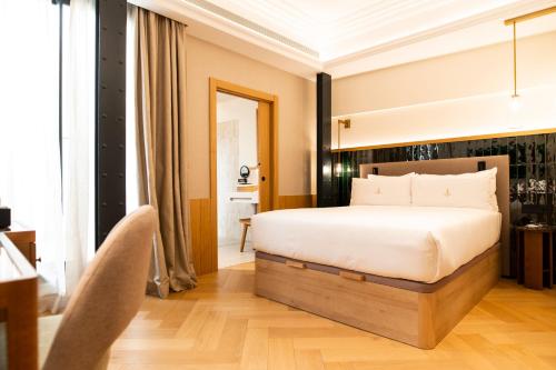 Katil atau katil-katil dalam bilik di Legado Magdalena Hotel
