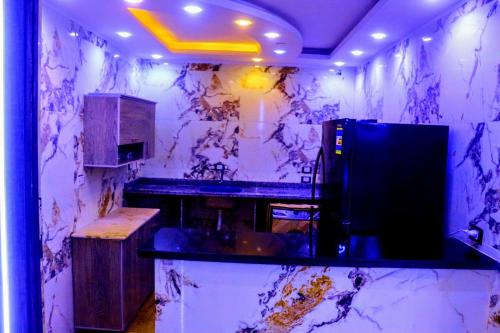 Kuchyň nebo kuchyňský kout v ubytování Deluxe villa Gardenia Pyramids