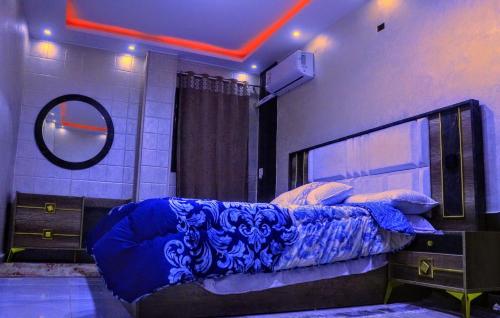 Postel nebo postele na pokoji v ubytování Deluxe villa Gardenia Pyramids