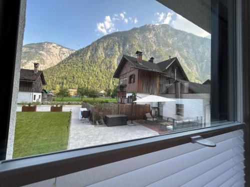 Φωτογραφία από το άλμπουμ του Guesthouse Alpinum στο Χάλστατ