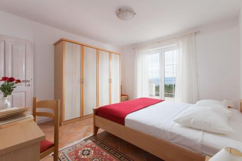 Ένα ή περισσότερα κρεβάτια σε δωμάτιο στο Villa Lidija