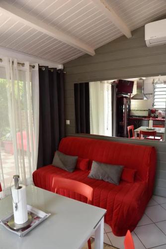 Χώρος καθιστικού στο Bungalow charmant à Le Gosier avec jardin clos et parking