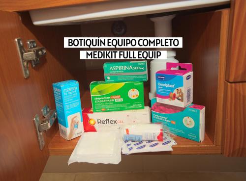 a bunch of boxes sitting on top of a door at Apartalux Magic Diamond in Oropesa del Mar