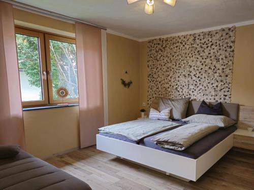 Postel nebo postele na pokoji v ubytování Ferienwohnung Anderl
