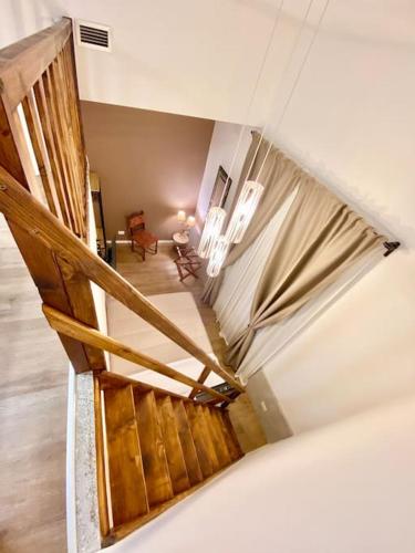 a view of a staircase in a house at Sebastian's Elegant Apartment in Aci Castello