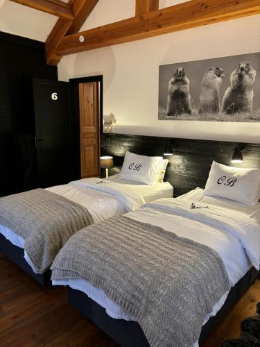 Postel nebo postele na pokoji v ubytování Le Clos Des Bansions