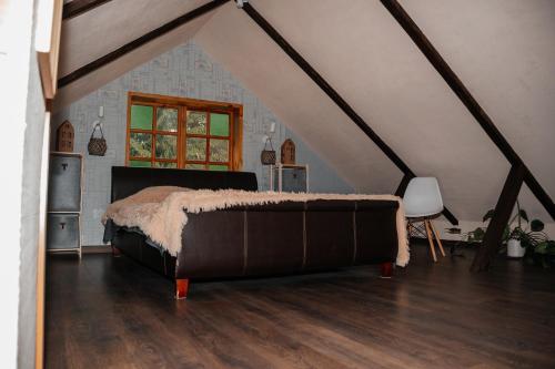 Katil atau katil-katil dalam bilik di Guest house ''Stropiki'' with Sauna and hot Tub