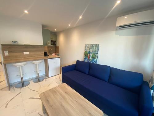 Posezení v ubytování Appartement face mer et port Santa Lucia climatisé et wifi