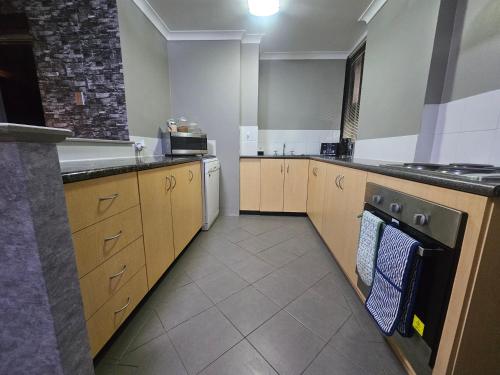 Kuchyň nebo kuchyňský kout v ubytování Melville Oasis