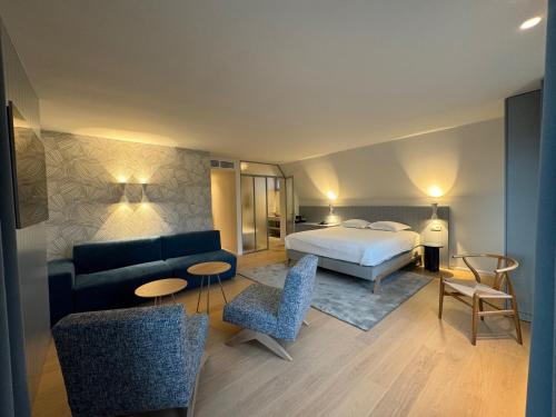 Postel nebo postele na pokoji v ubytování Hotel Iris