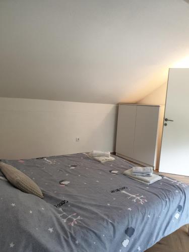 Postel nebo postele na pokoji v ubytování Apartman Nour