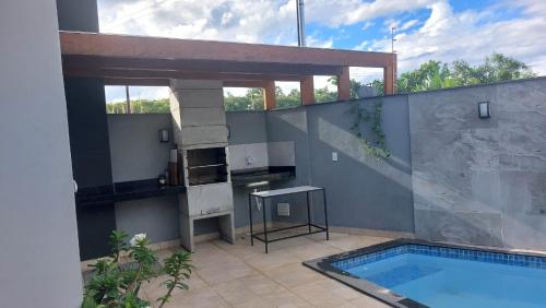 Πισίνα στο ή κοντά στο Suítes Praia e Sol