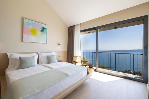 Postel nebo postele na pokoji v ubytování Holiday Home Poeta Brela