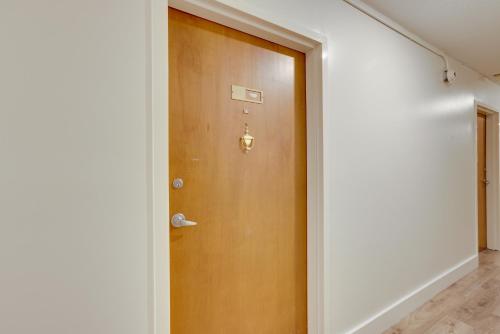 a wooden door in a room with a hallway at Studio in Gadsden about 10 Mi to the Coosa River! in Gadsden