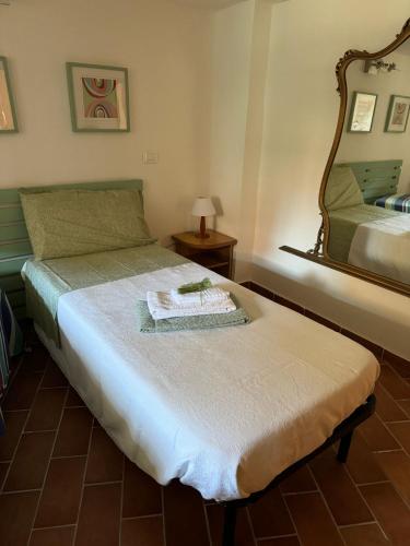 Katil atau katil-katil dalam bilik di Casa tra Mare e campagna in Toscana